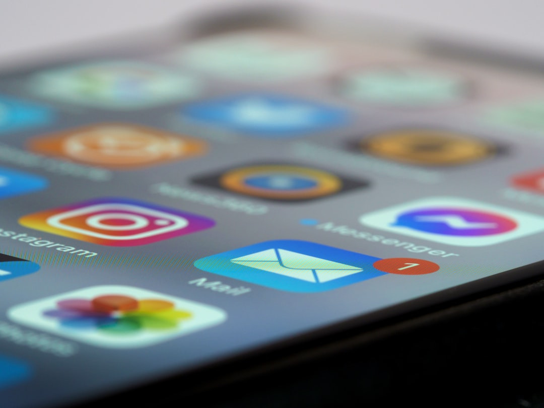 Smartphone screen shows colorful app icons and one unread email.